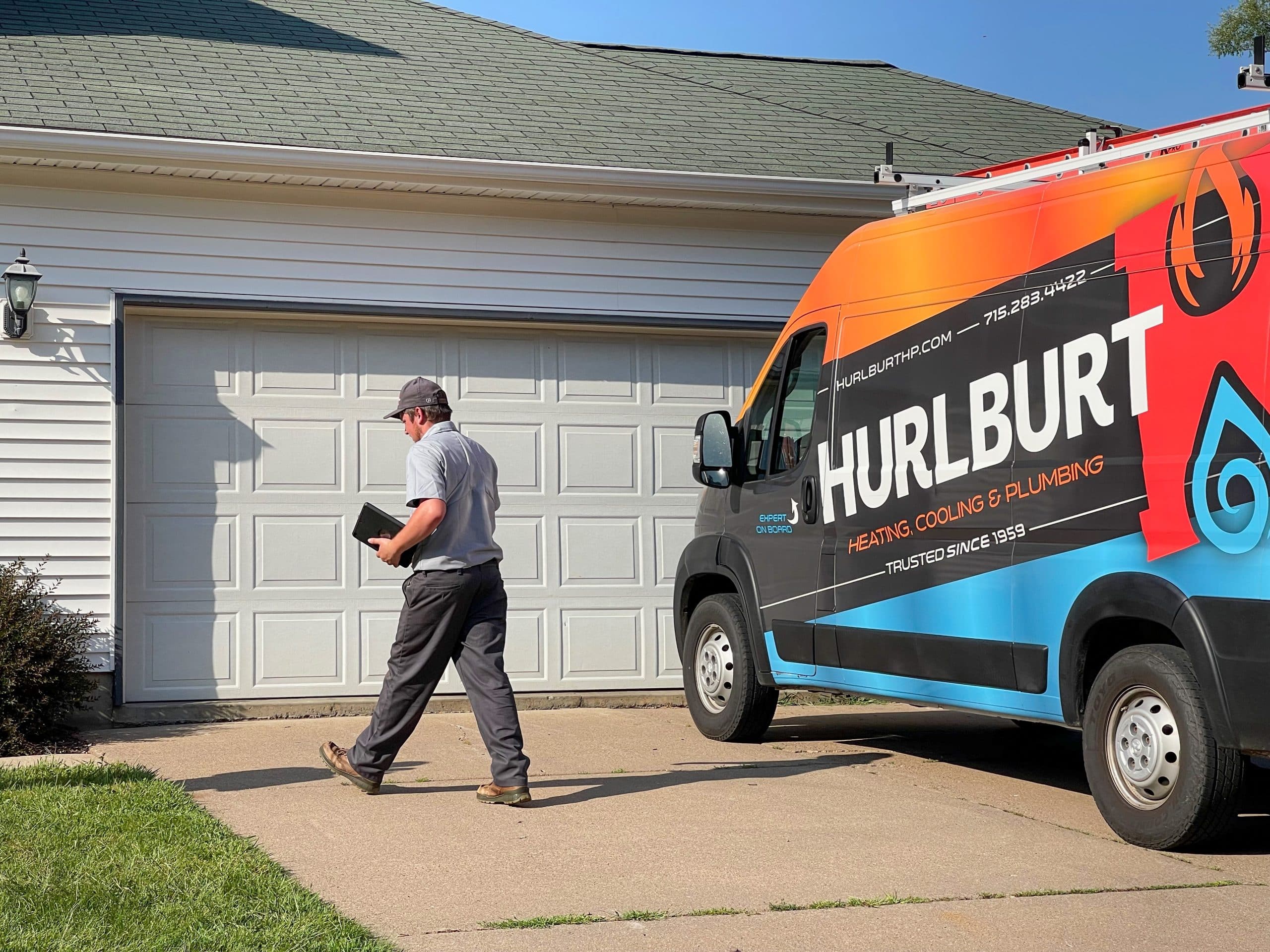 HVAC Technician Going Inside a Customer Home in Stillwater, MN