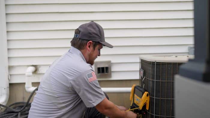 Hurlburt Tech Working On Air Conditioning System