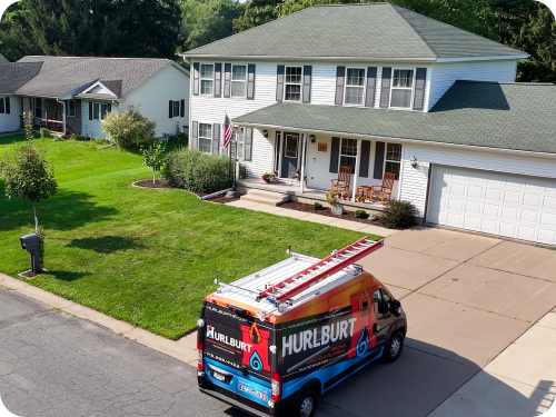 Hurlburt van backing out of house driveway